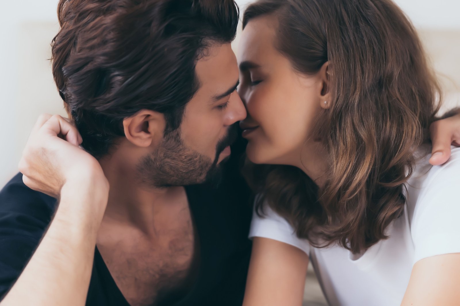 Intimate sensual husband and wife enjoying touching each other