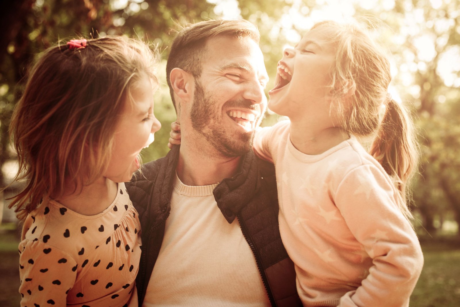 Kids having fun with their father on fathers day.
